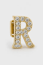Grillz letters — sur fond gris - Or - lettre R