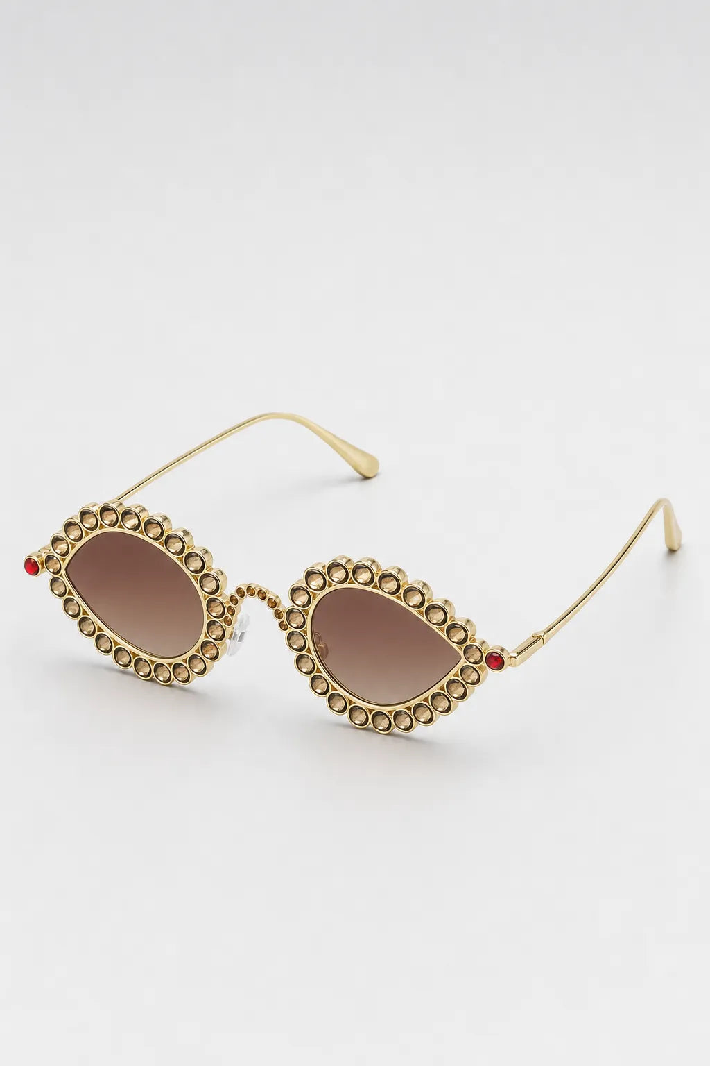 Lunette Pharrell Williams — sur fond gris - couleur Marron/Or