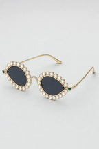 Lunette Pharrell Williams — sur fond gris - couleur Black/Or