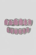Pink grillz — sur fond gris
