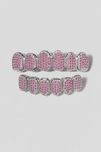 Pink grillz — sur fond gris